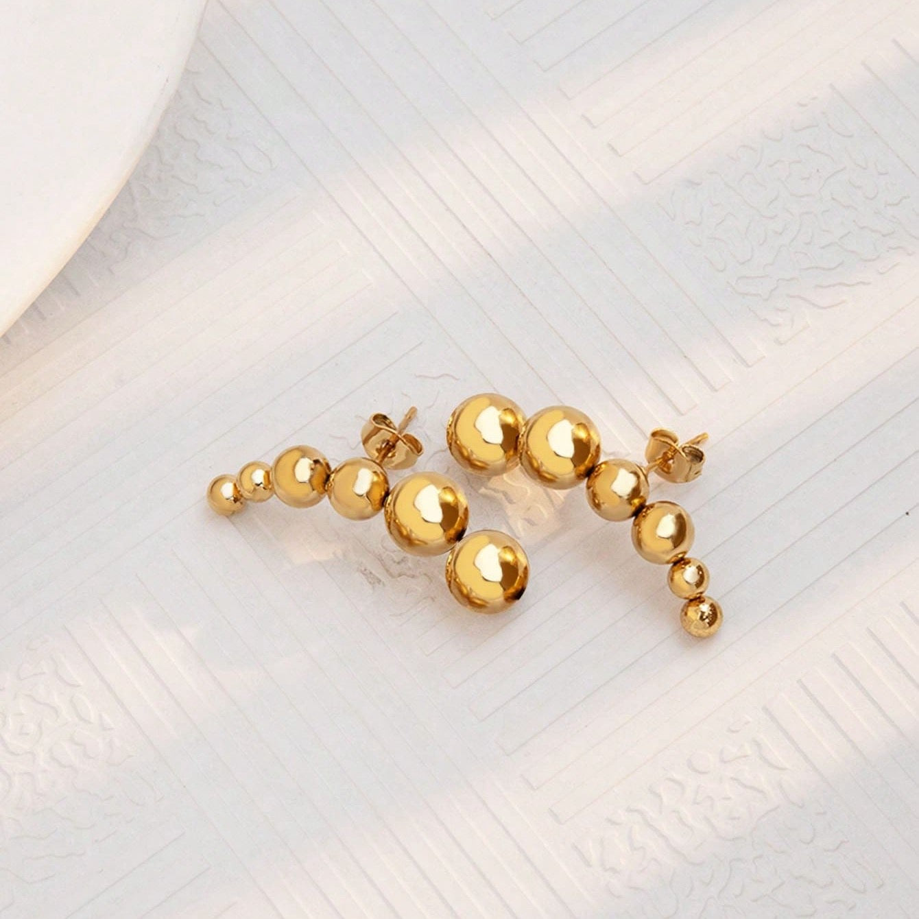 Golden beads cuff style studs