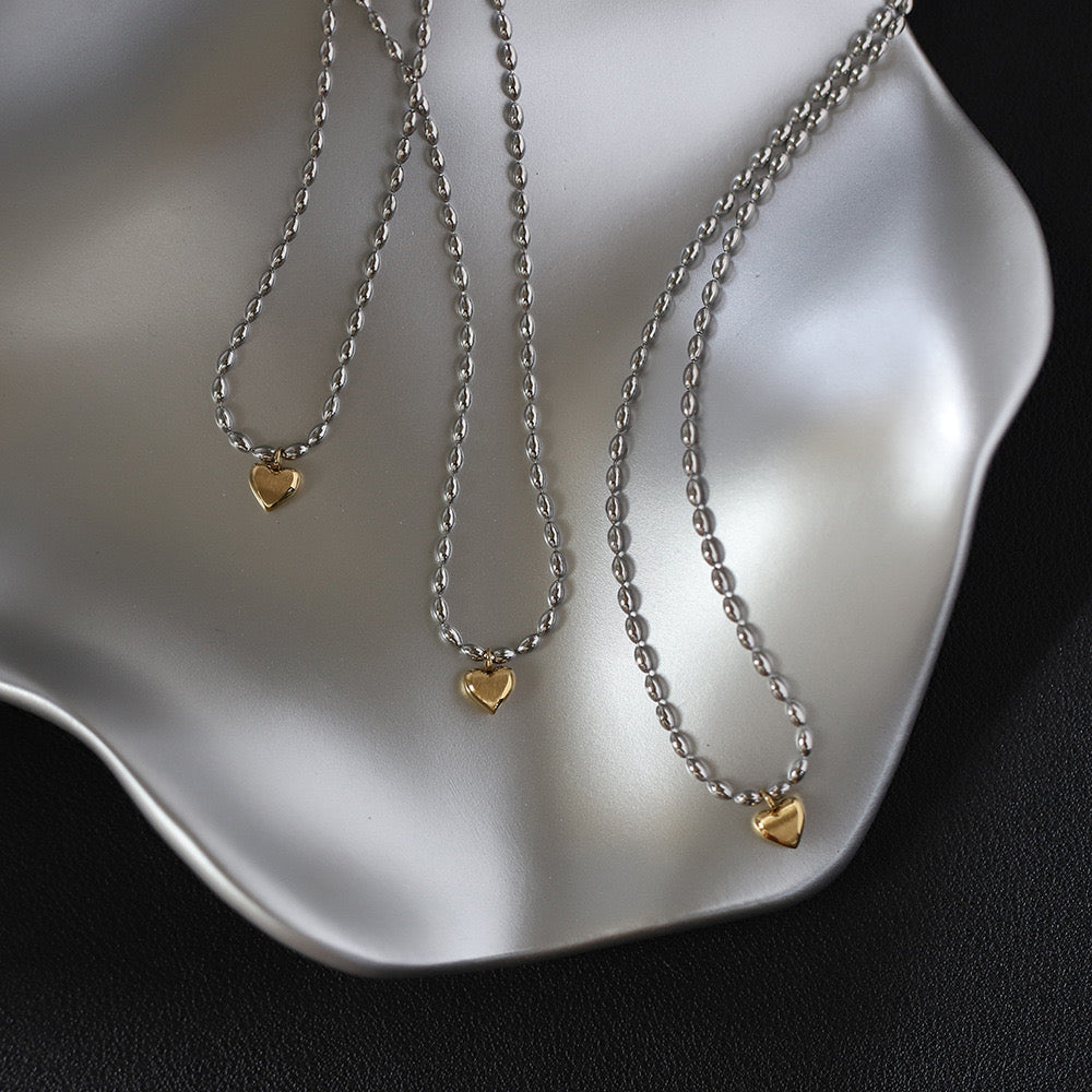 Matar chain with a heart necklace