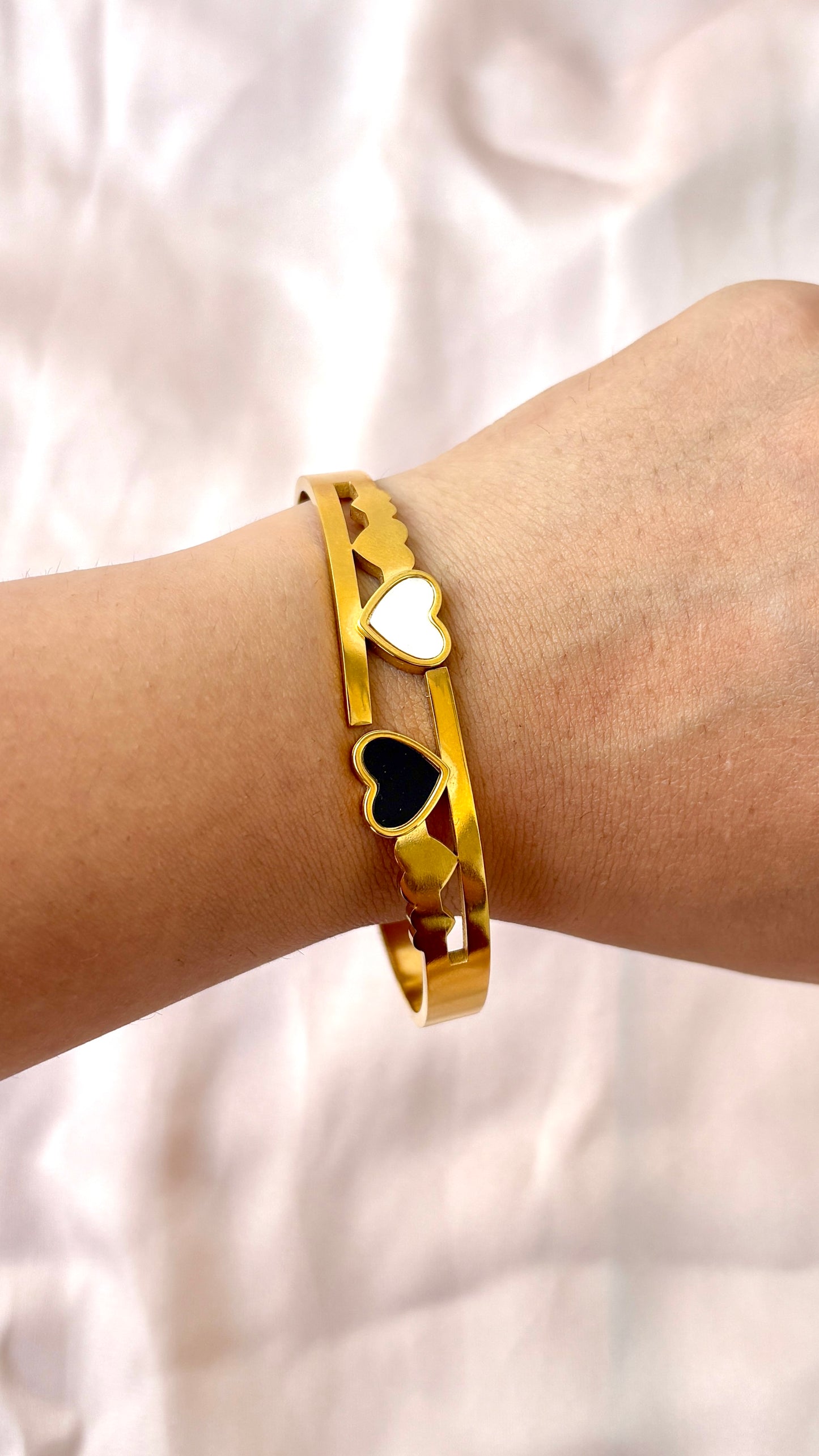 Black and white open heart bracelet