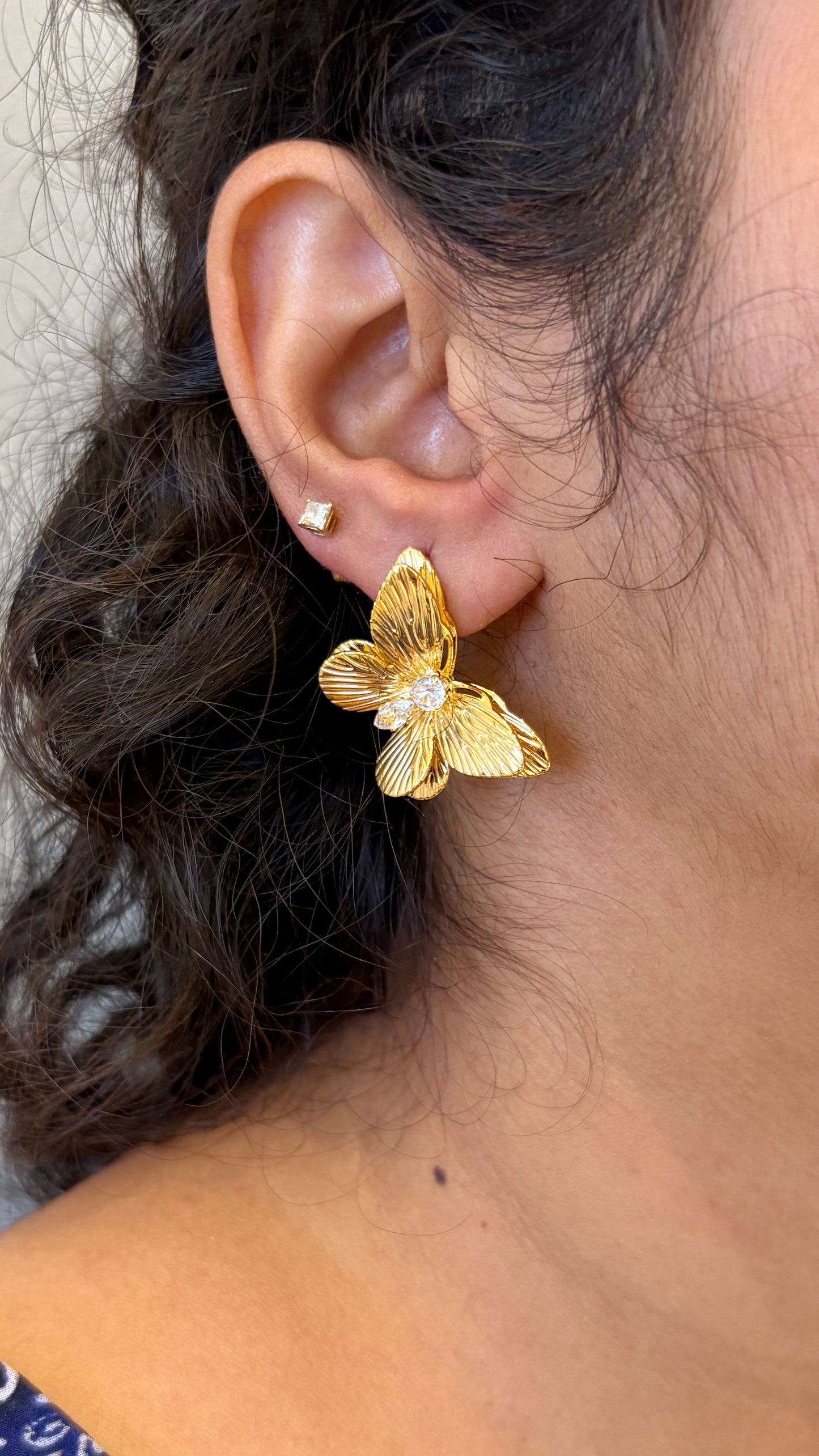 Golden butterfly with stone earrings