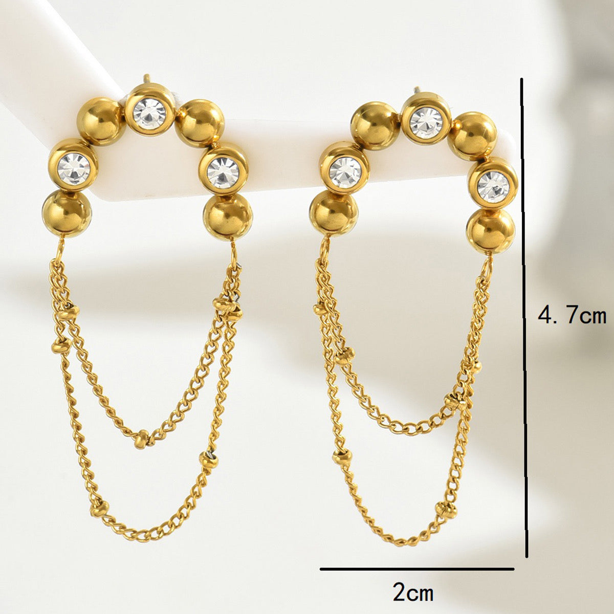 Half circle with dangling chain