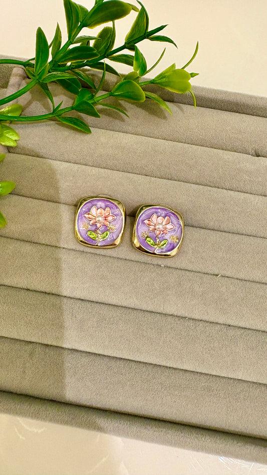 Flower on purple square with golden outline