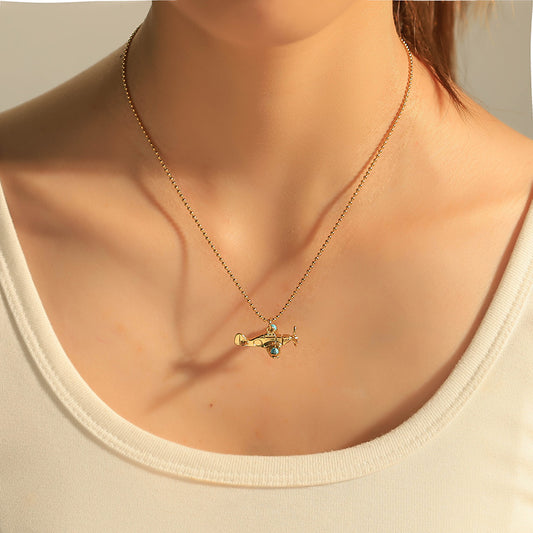 Aeroplane in a dainty neckchain
