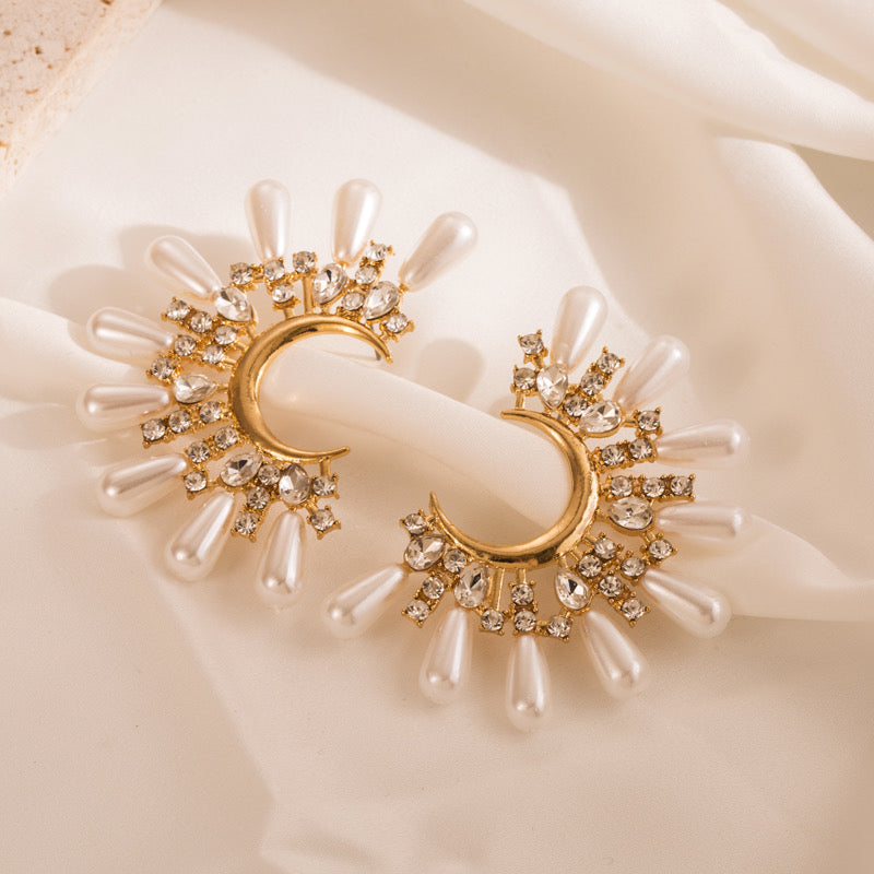 Half sun pearl earrings