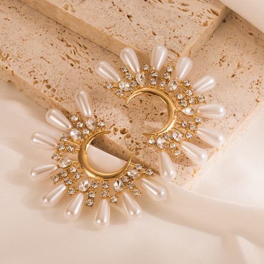 Half sun pearl earrings