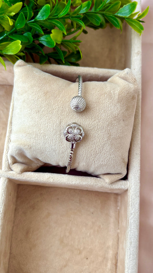 Elevated plain flower with a ball