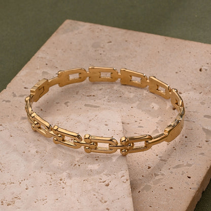 Horse shoe link bracelet