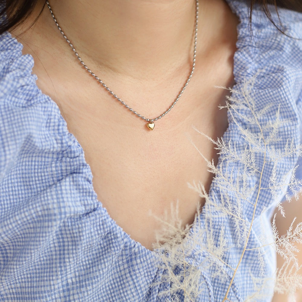 Matar chain with a heart necklace