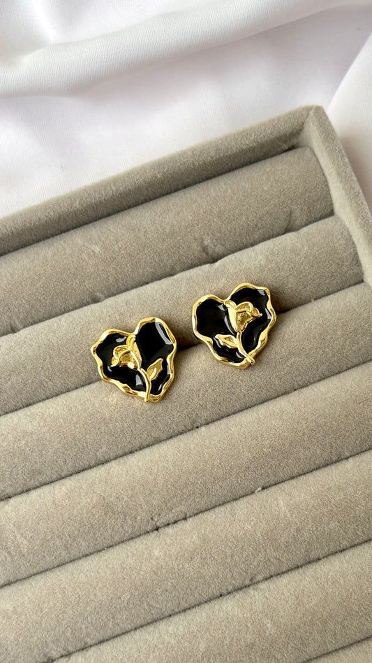Golden rose on a black heart stud