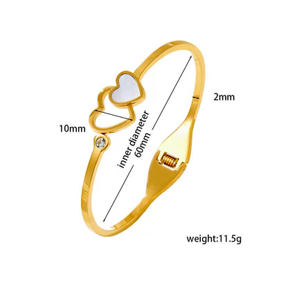 Intertwined double heart bracelet