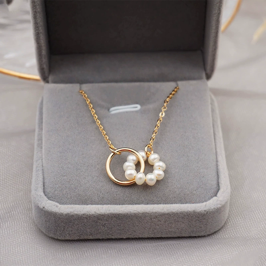 Interwind pearl and gold ring neck chain