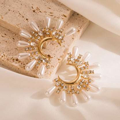 Half sun pearl earrings