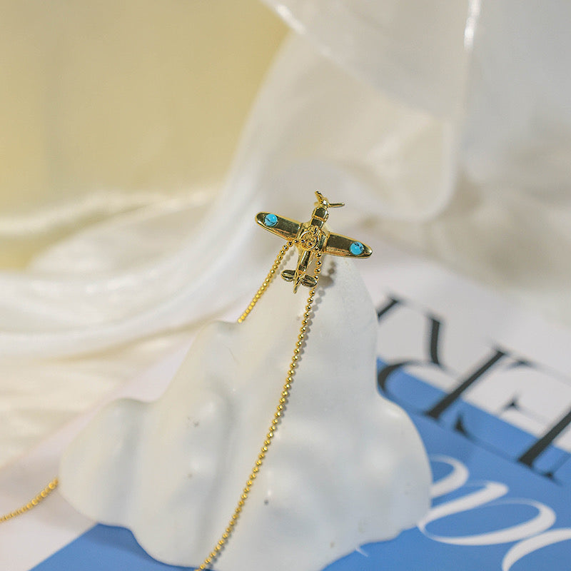 Aeroplane in a dainty neckchain
