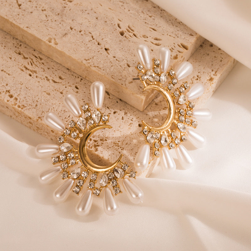 Half sun pearl earrings