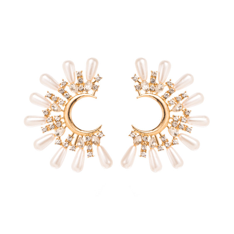 Half sun pearl earrings