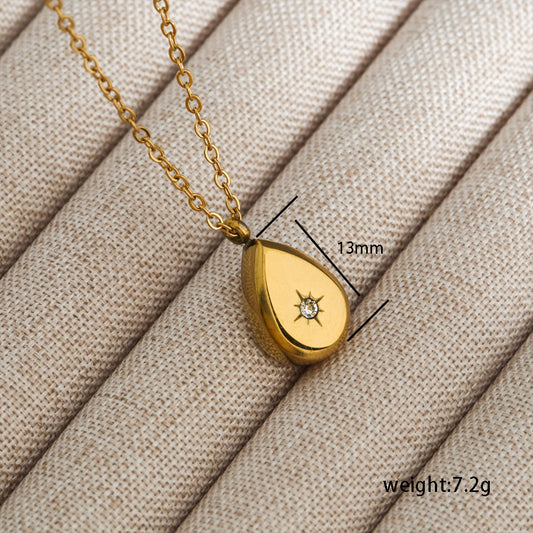 Golden solid drop with a diamond star