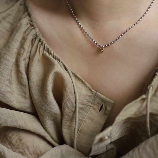 Matar chain with a heart necklace